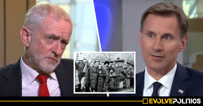 Jeremy Hunt slammed after using Auschwitz visit to imply that 'Corbyn could be the next Hitler'